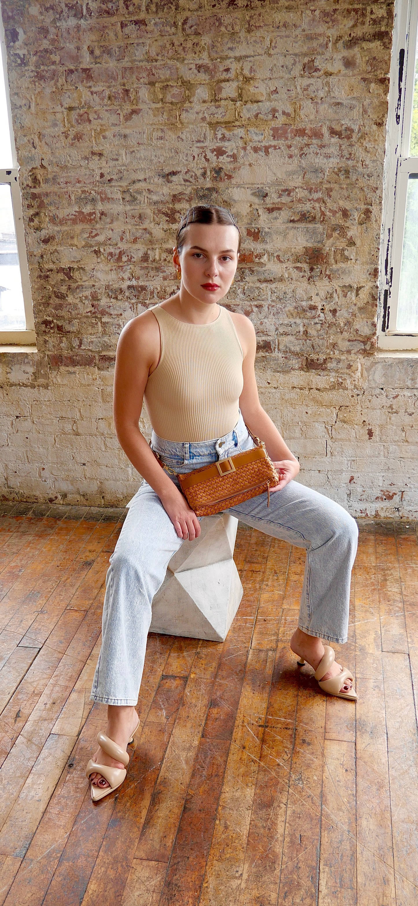 The Quintessential bag in cognac brown