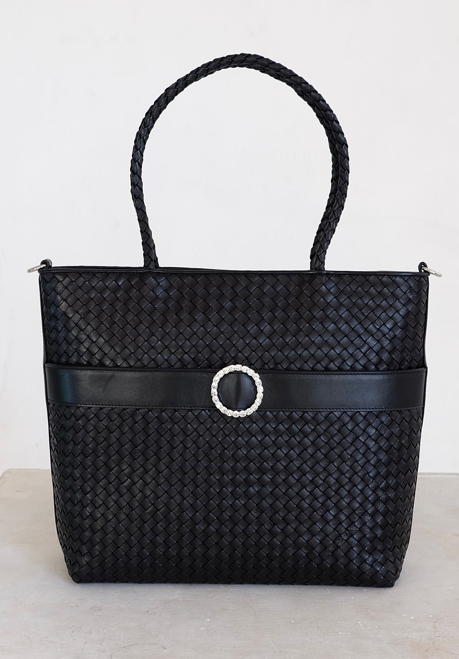 Sustainable Italian leather designer handbag, medium tote and crossbody in charcoal-black. Handbag with accent buckle that is a functional work of art.