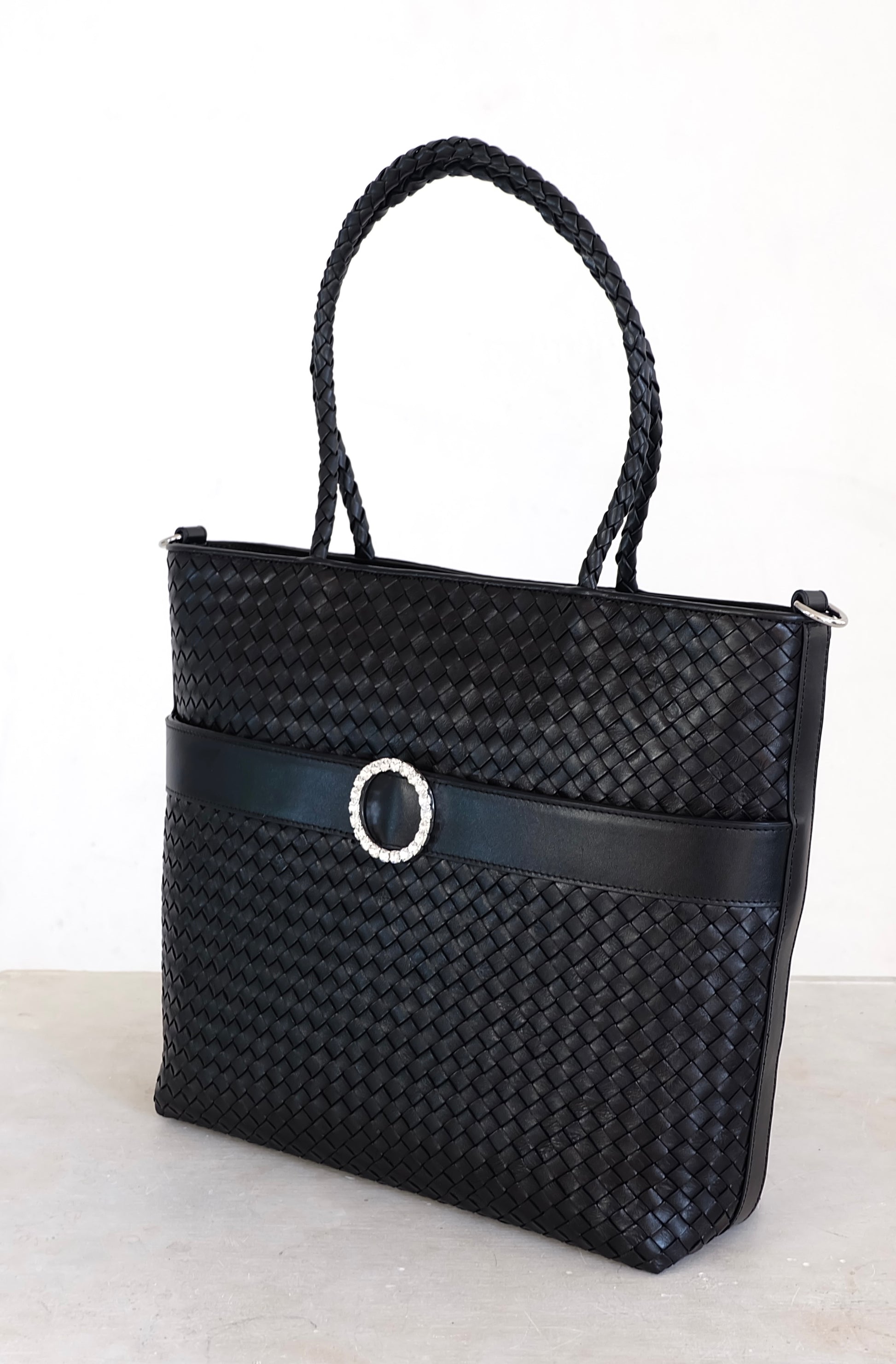 Sustainable Italian leather designer handbag, medium tote and crossbody in charcoal-black. Handbag with accent buckle that is a functional work of art.