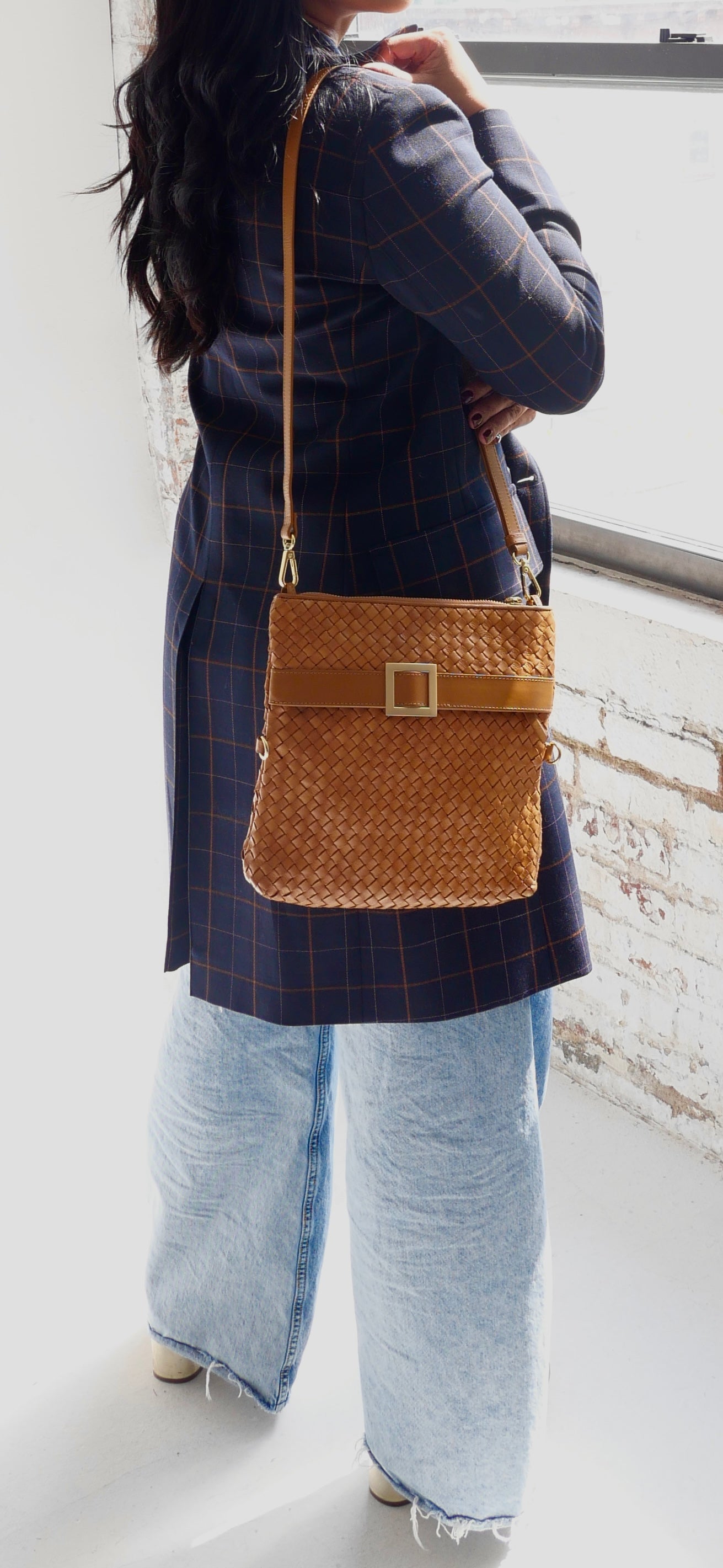 The Quintessential bag in cognac brown