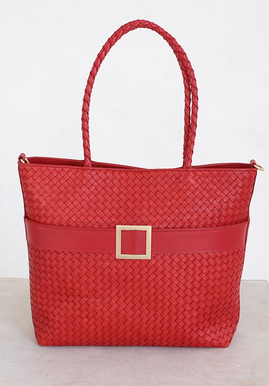 Sustainable Italian leather designer handbag, medium tote and crossbody in chili red. Handbag with accent buckle that is a functional work of art.