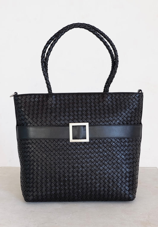Sustainable Italian leather designer handbag, medium tote and crossbody in charcoal-black. Handbag with accent buckle that is a functional work of art.